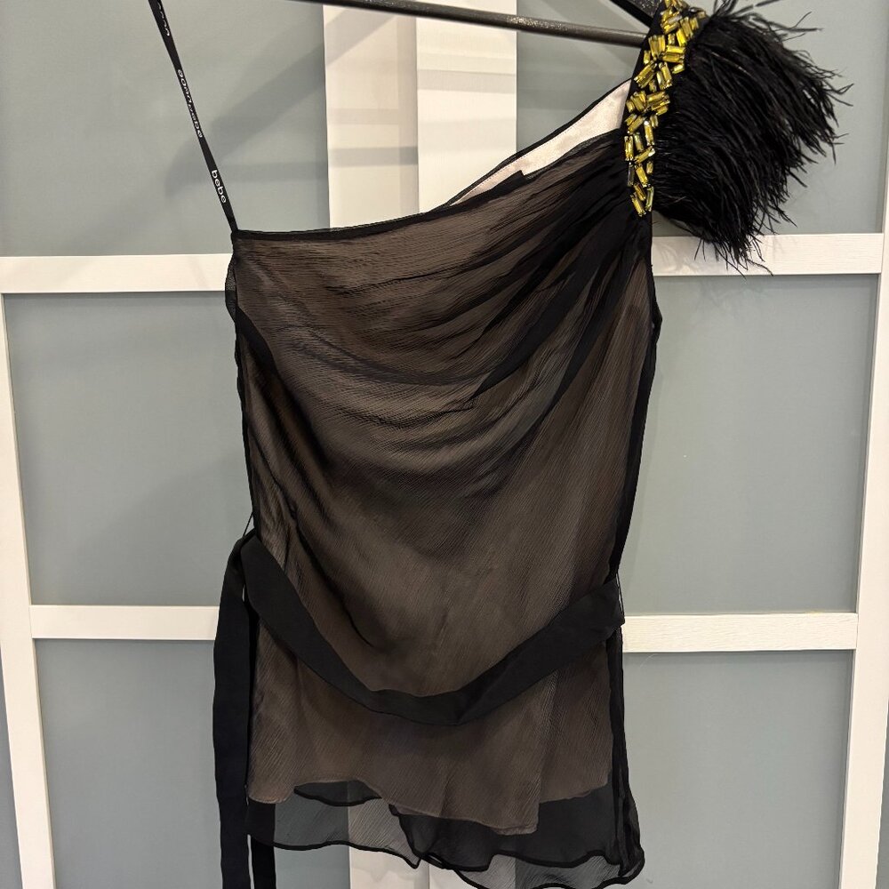 Bebe half shoulder jeweled feathered shirt